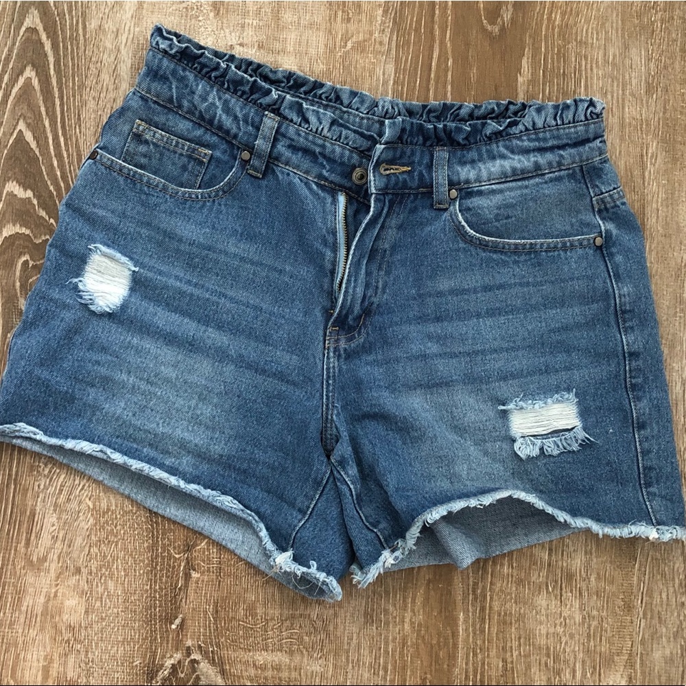High waisted denim shorts with ruffle detail